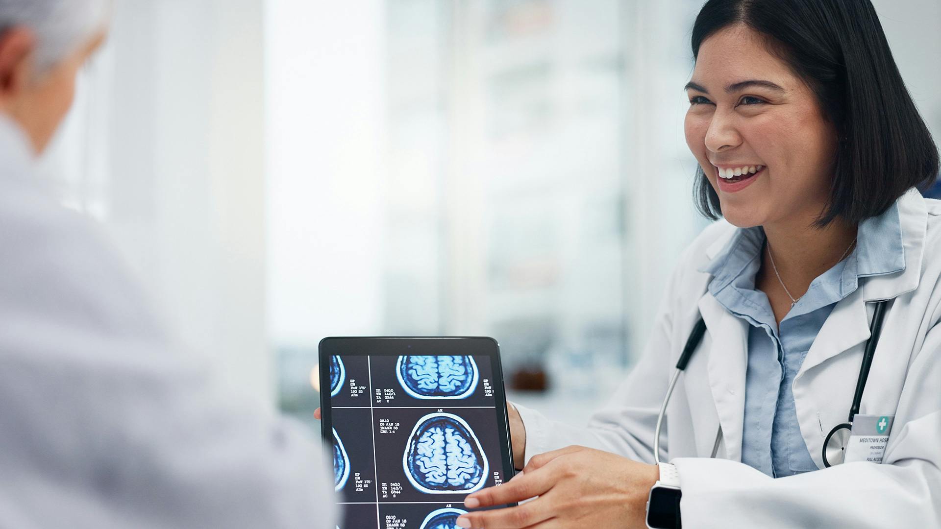 Doctor showing brain scan