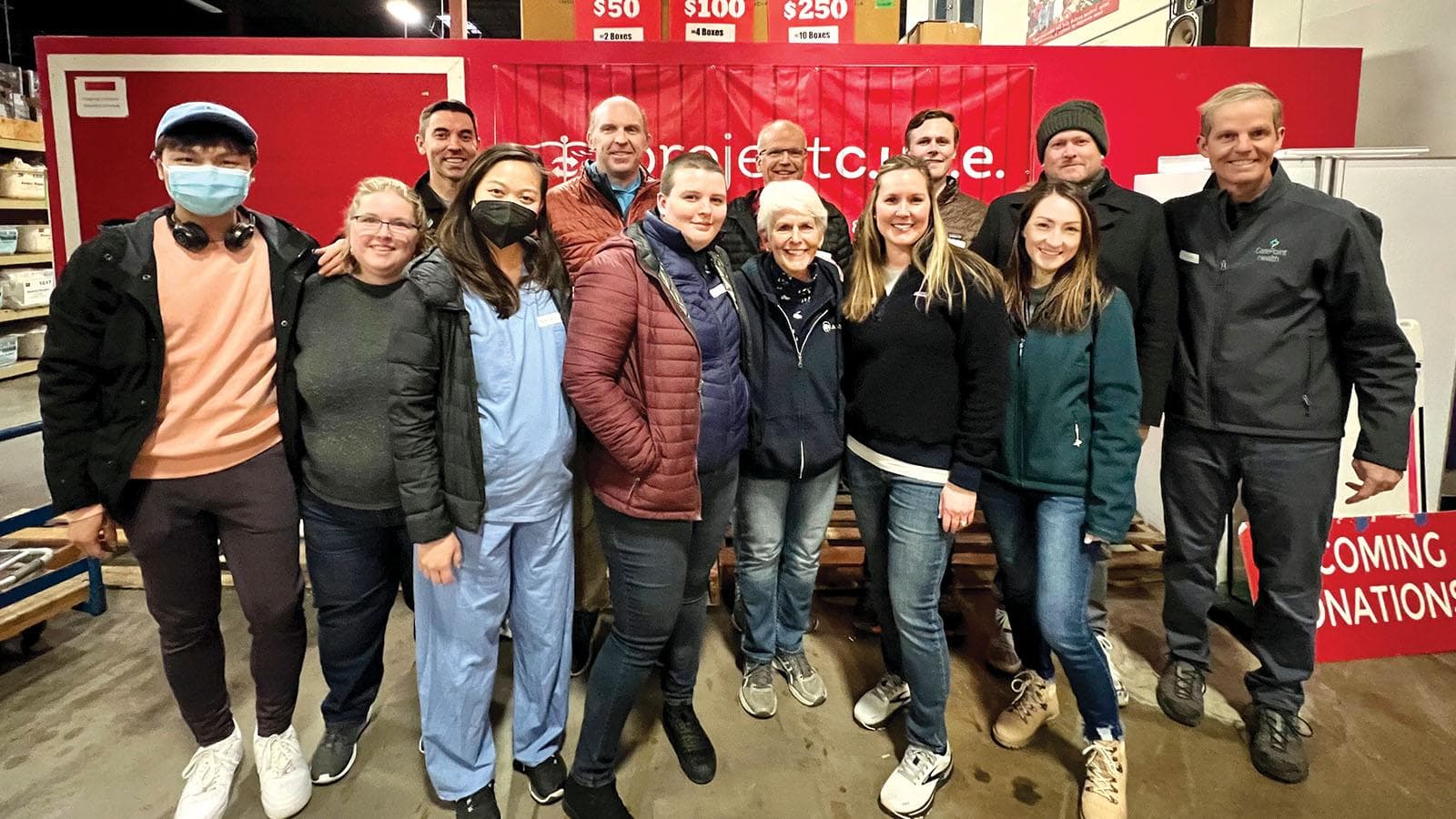 Several CarePoint Health employees posing for a photo