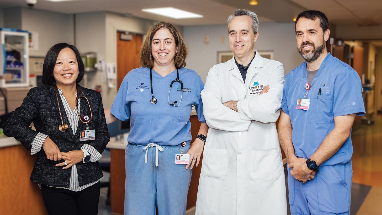 4 doctors posing for a photo