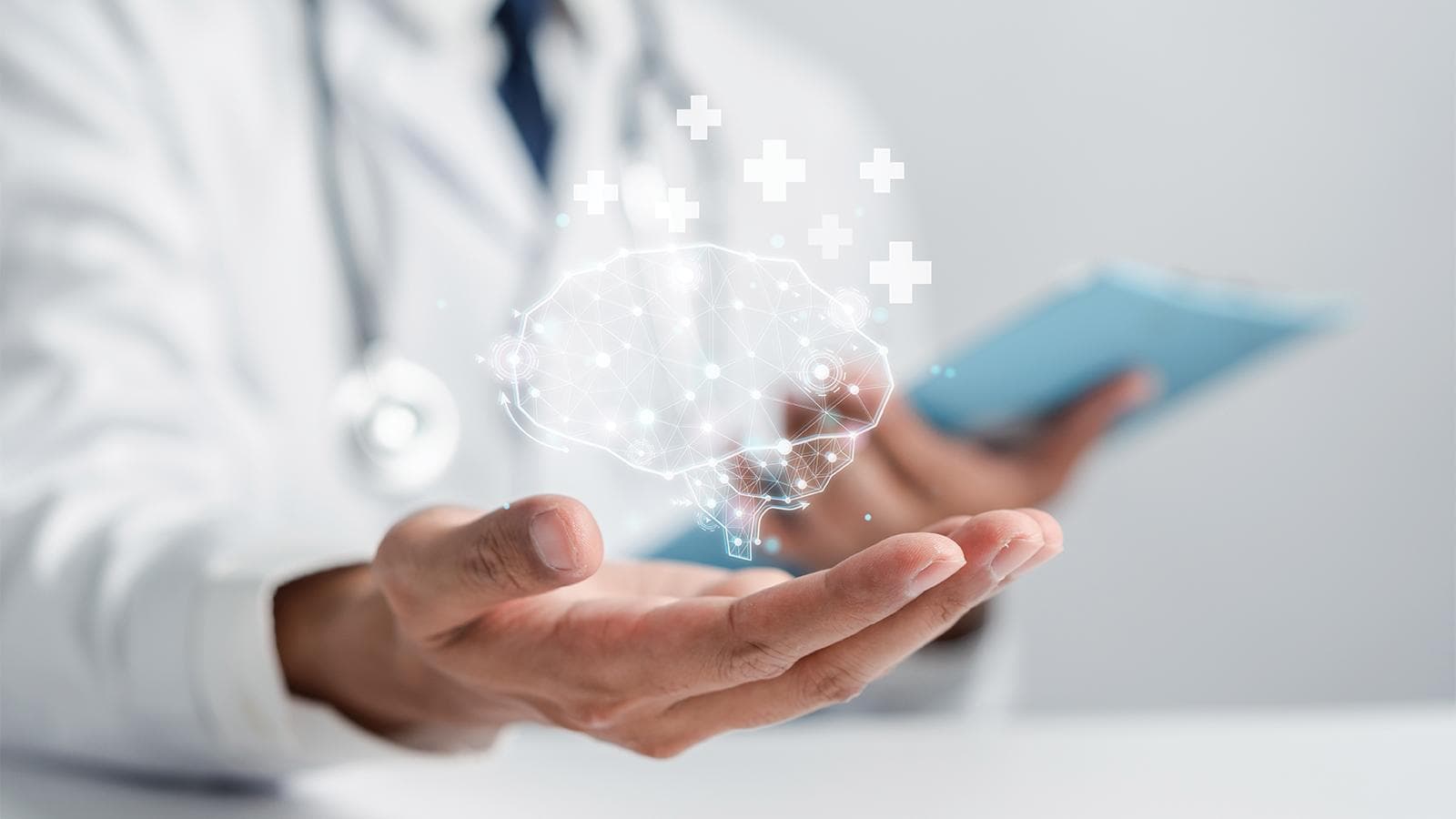 Image of doctor holding a virtual brain